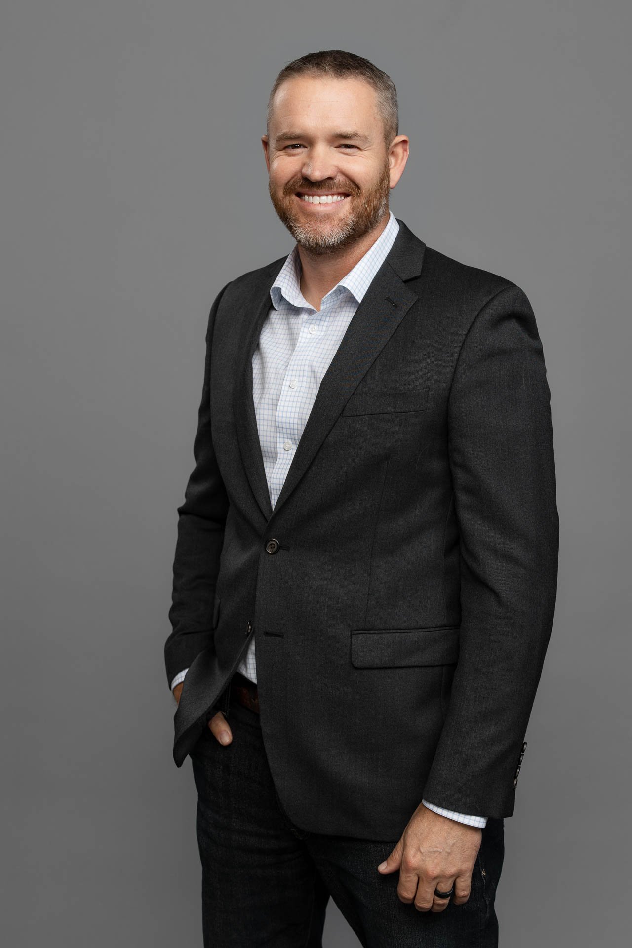 Portrait of Chris Uhl, Senior Project Manager at Hall & Hill Construction
