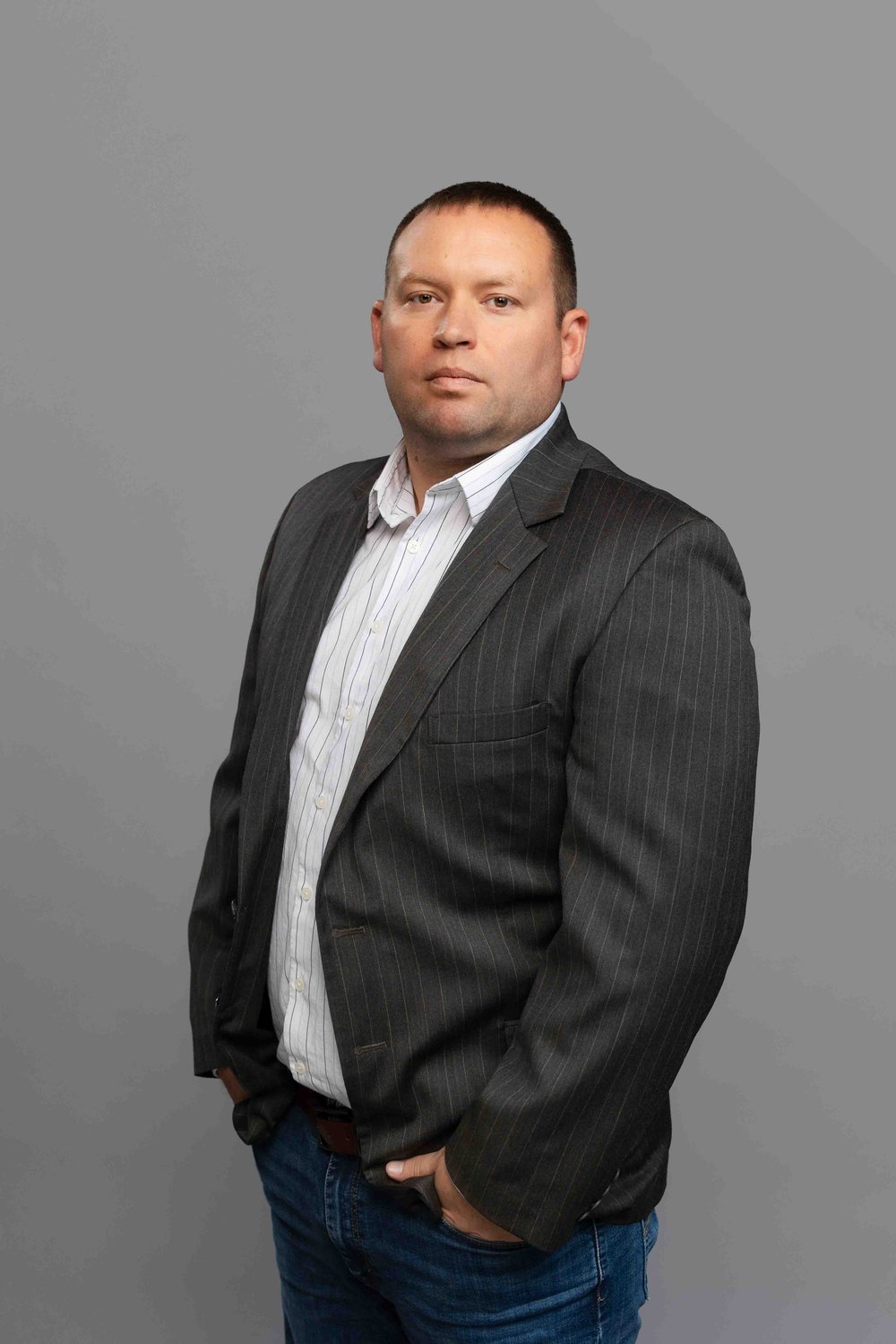 Portrait of Scot Uhl, Project Manager at Hall & Hill Construction
